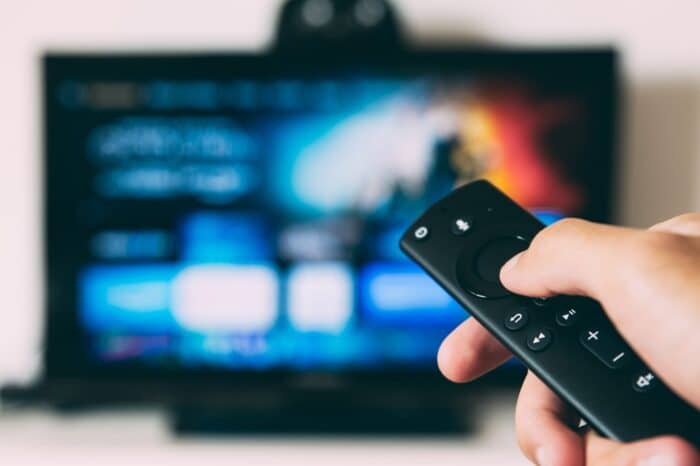 Silhouette TV with Remote Stock Photo